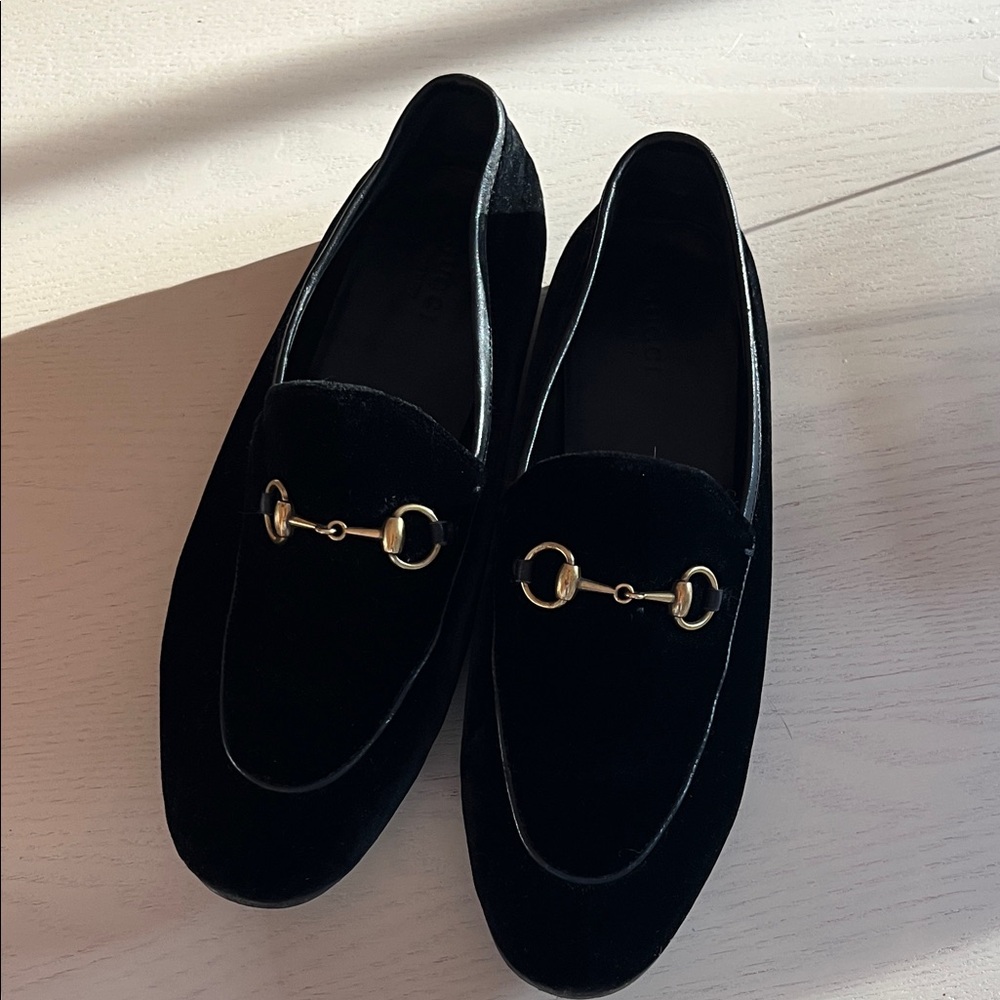 Gucci Black Loafers with Gold Accents